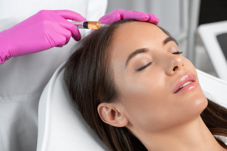 woman getting prp hair results at Essentia Intima