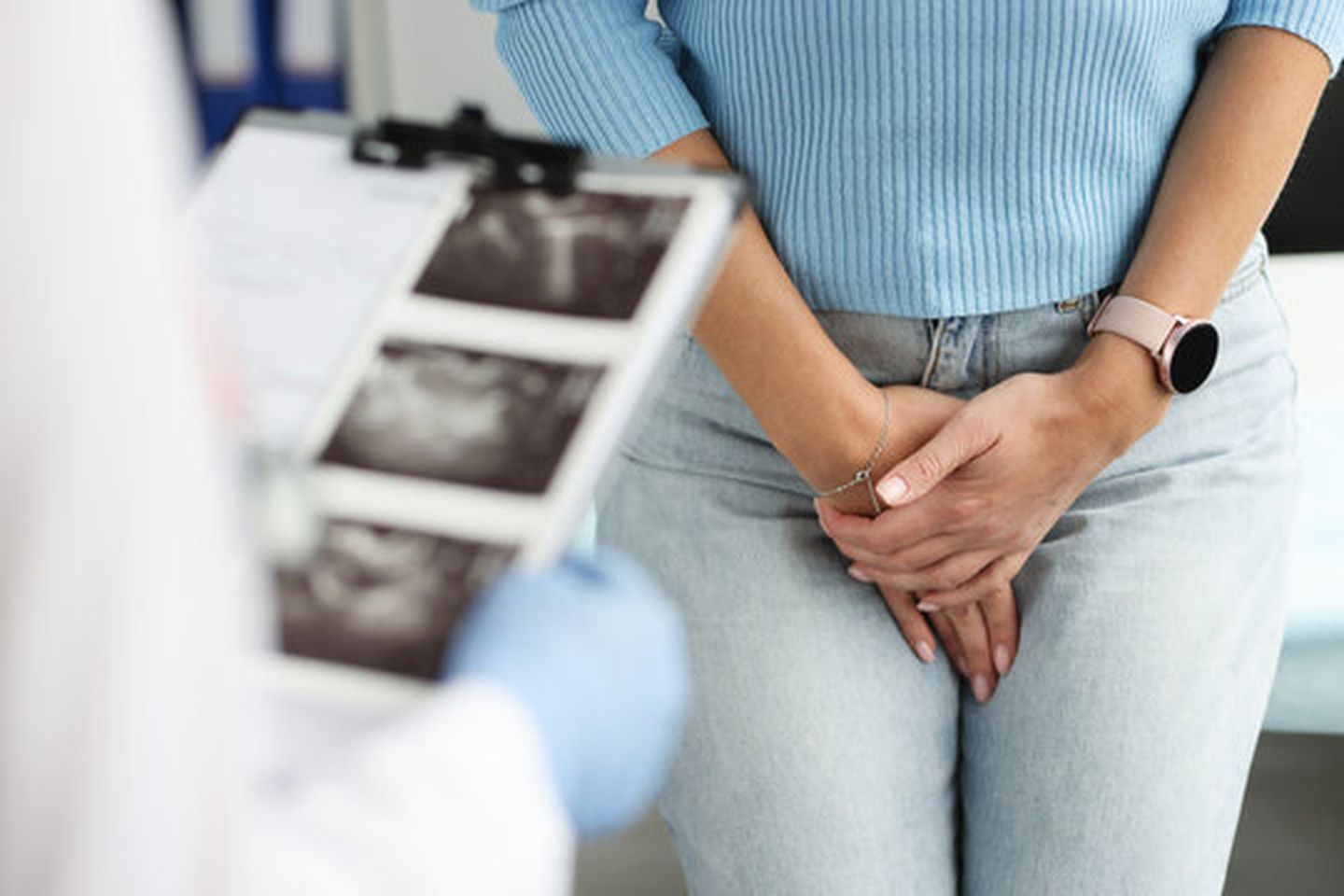 Woman discussing intimate wellness concerns with gynecologist at women's health clinic